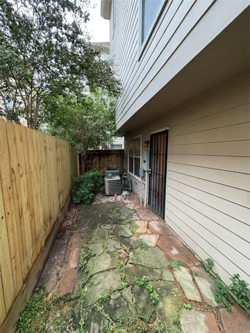 a view of a back yard of the house