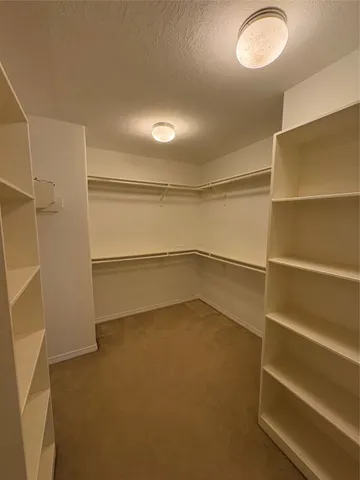 a view of an empty room with empty racks