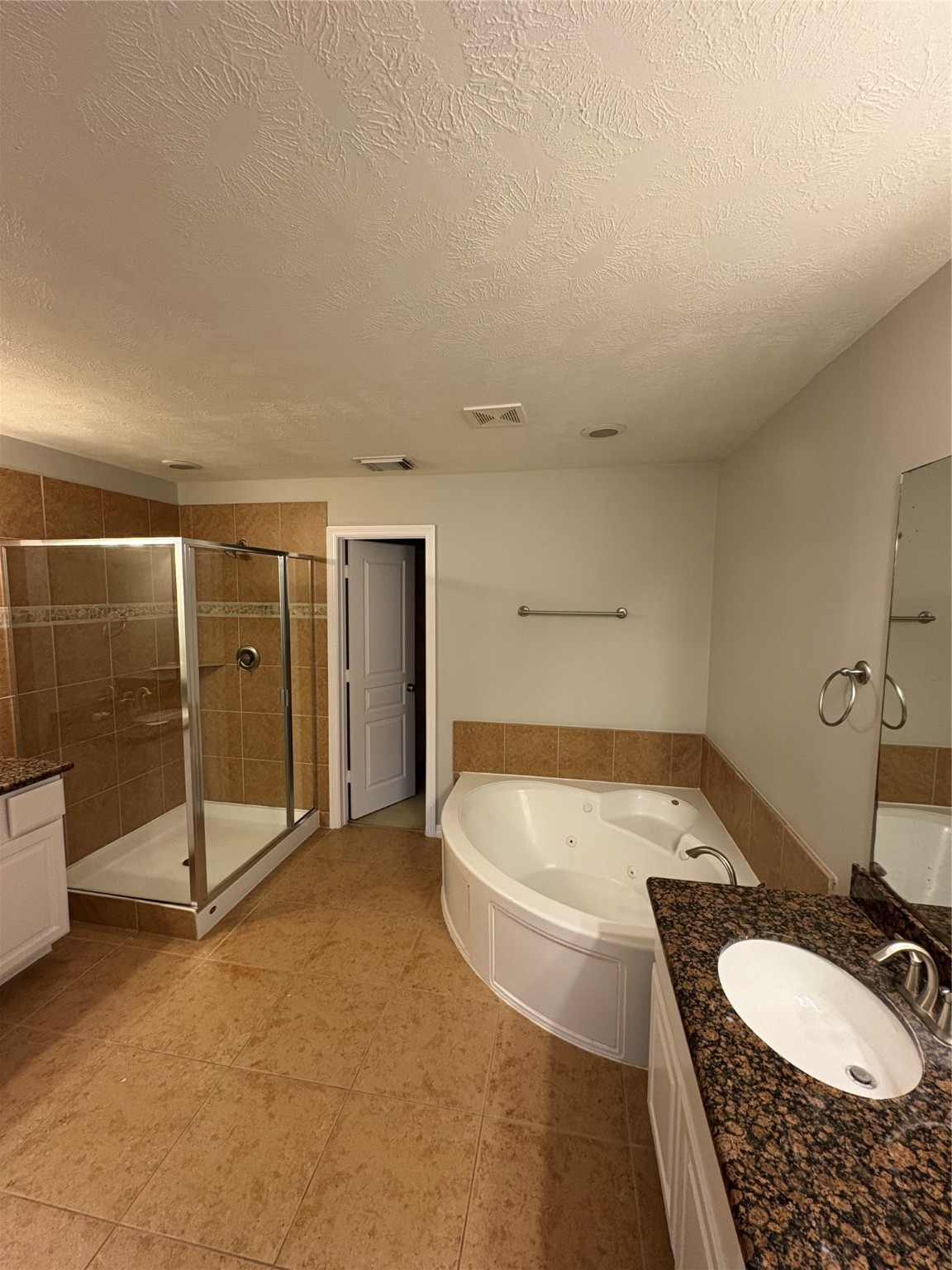 2614 Enclave At Shady Acres Court Houston, TX 77008 - Photo 10 of 15 a bathroom with a tub sink and mirror