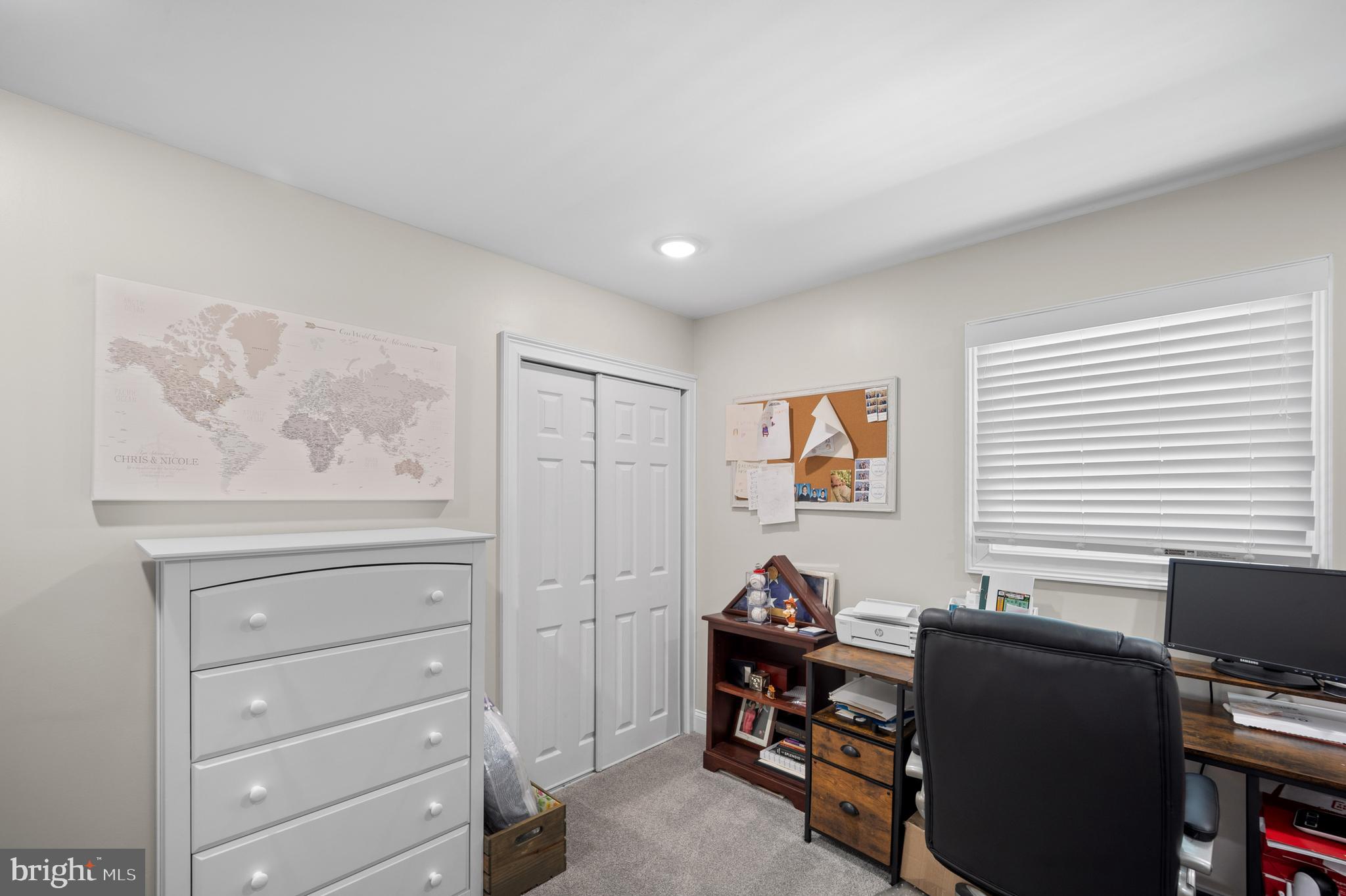 837 Fairfield Road Fairless Hills, PA 19030 - Photo 17 of 31 a view of a workspace with furniture and a window