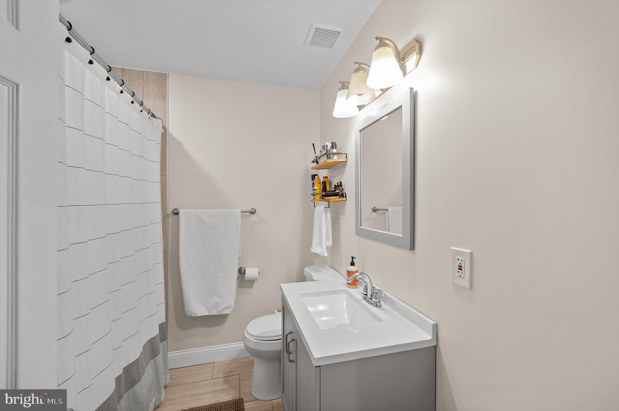 837 Fairfield Road Fairless Hills, PA 19030 - Photo 20 of 31 a bathroom with a sink a toilet and shower