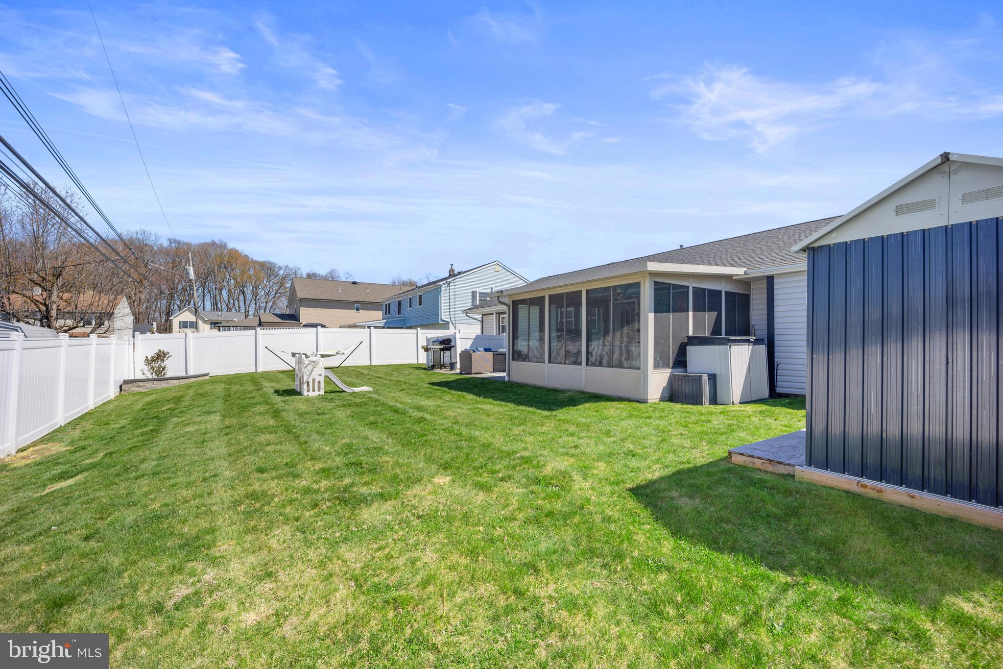 837 Fairfield Road Fairless Hills, PA 19030 - Photo 28 of 31 a view of a house with backyard and a garden
