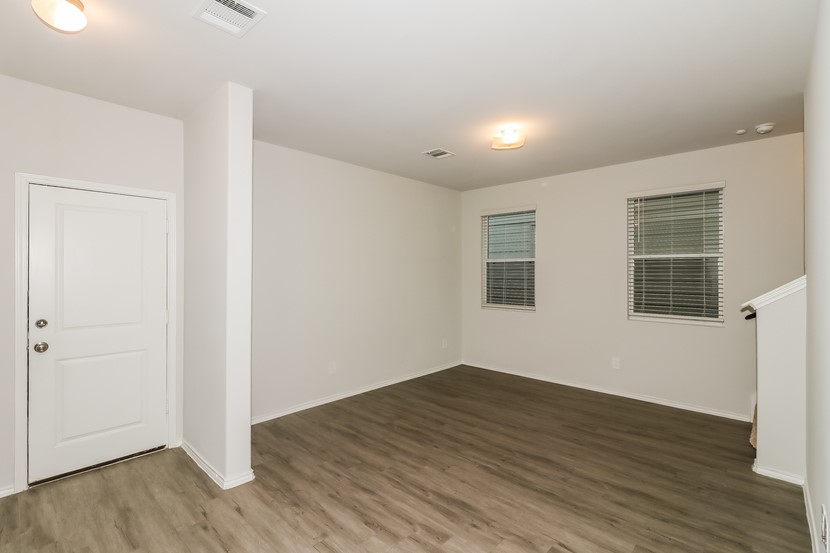 21626 Mamba Way Houston, TX 77073 - Photo 4 of 12 a view of a room with wooden floor and window