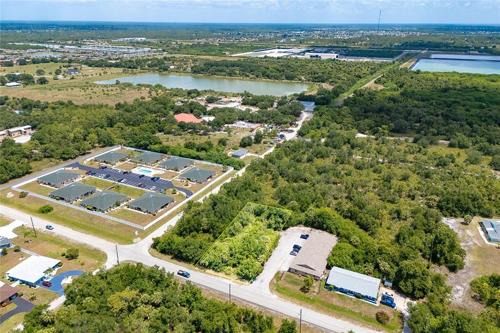 25018 Harbor View Road Punta Gorda, FL 33980 - Photo 8 of 12 an aerial view of residential houses with outdoor space and river