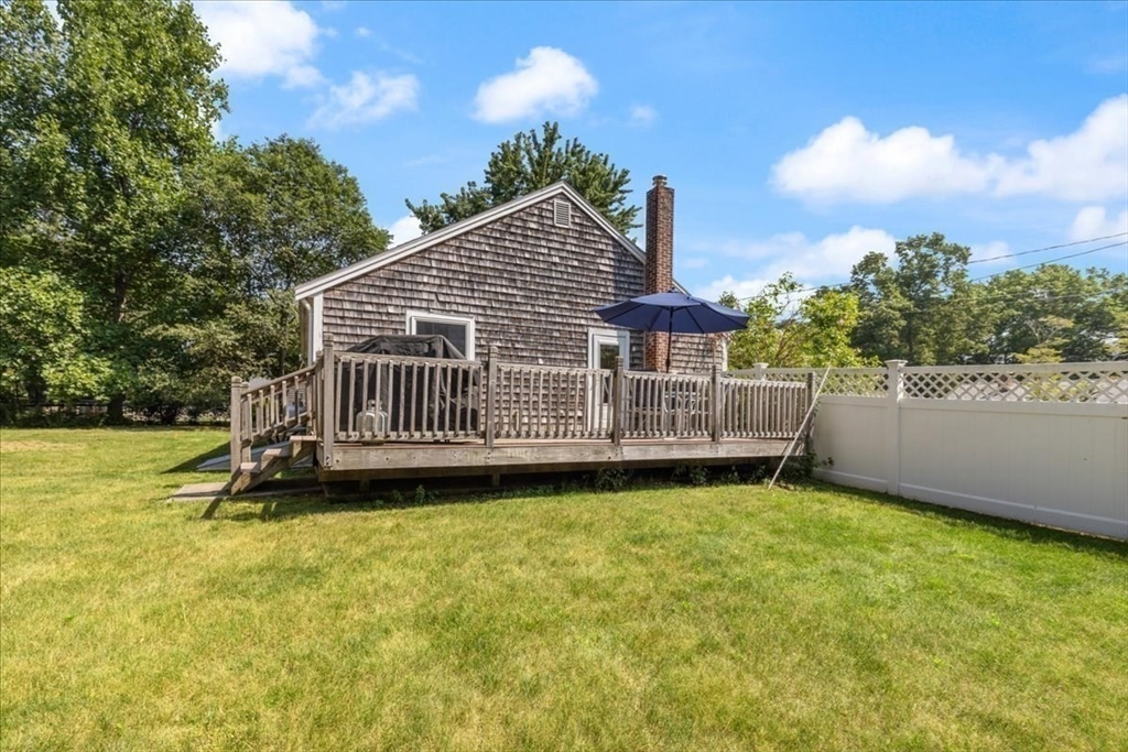 12 Bay Path Kingston, MA 02364 - Photo 20 of 24 a view of a house with a yard and sitting area