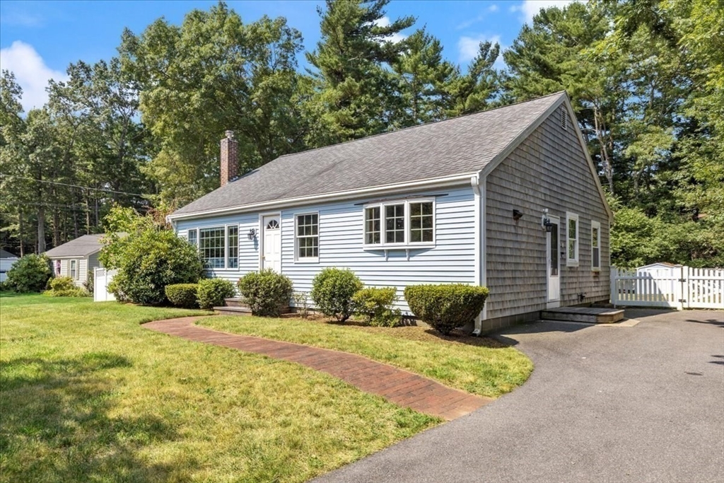 12 Bay Path Kingston, MA 02364 - Photo 2 of 24 a view of a house with backyard and a tree