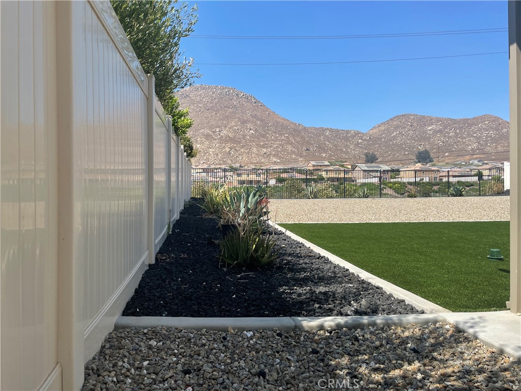 20952 Telegraph Road Riverside, CA 92507 - Photo 4 of 42 Side yard with professional landscaping