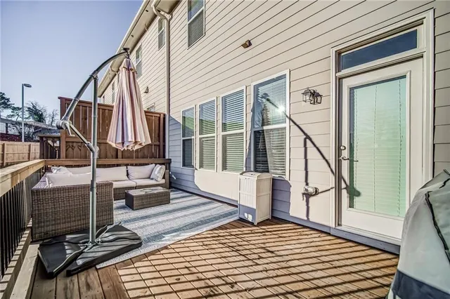 a view of balcony and wooden floor