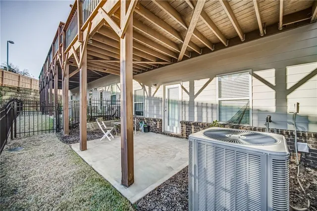 a view of swimming pool with patio