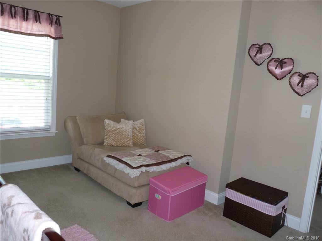 221 River Clay Road, Unit 183 Fort Mill, SC 29708 - Photo 15 of 20 a living room with furniture and a window