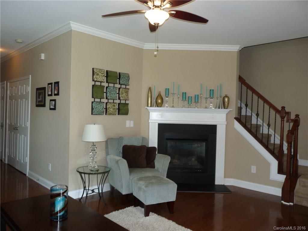 221 River Clay Road, Unit 183 Fort Mill, SC 29708 - Photo 4 of 20 a living room with furniture and a fireplace