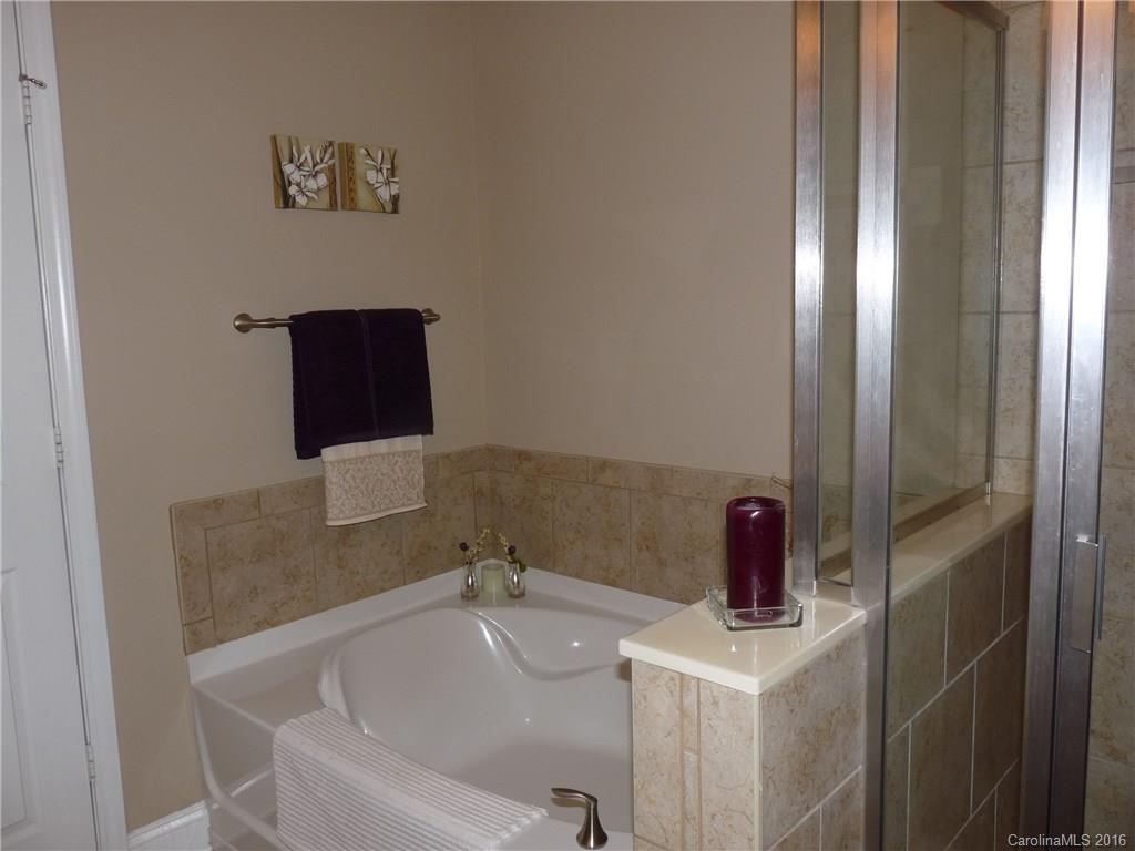 221 River Clay Road, Unit 183 Fort Mill, SC 29708 - Photo 9 of 20 a bathroom with a sink and mirror