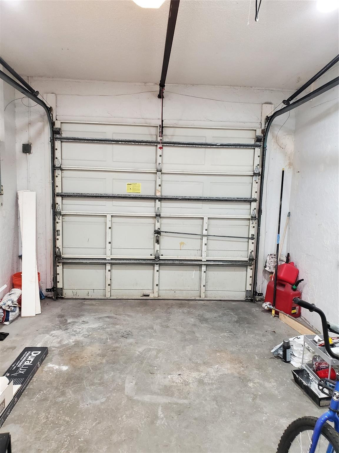 Undisclosed Address Tamarac, FL 33319 - Photo 11 of 21 a view of room with garage