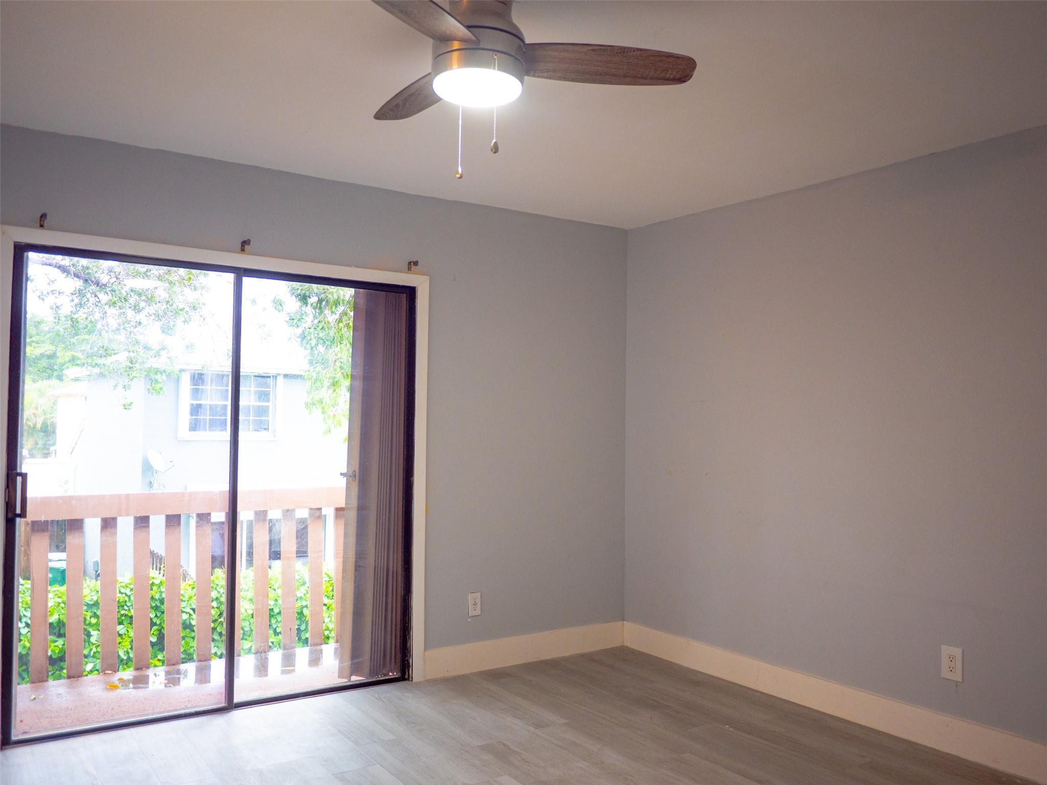 Undisclosed Address Tamarac, FL 33319 - Photo 15 of 21 an empty room with a window