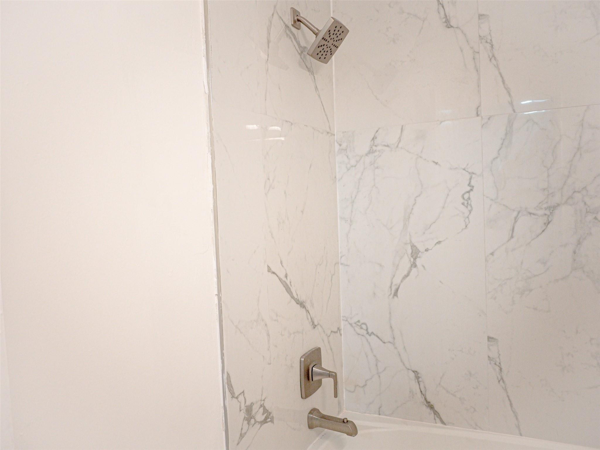 Undisclosed Address Tamarac, FL 33319 - Photo 17 of 21 a bathroom with a bathtub