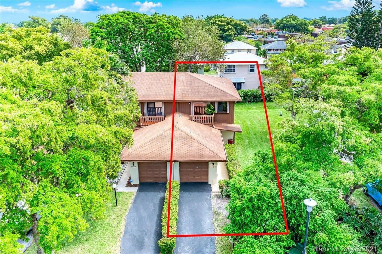 Undisclosed Address Tamarac, FL 33319 - Photo 3 of 21 an aerial view of a house