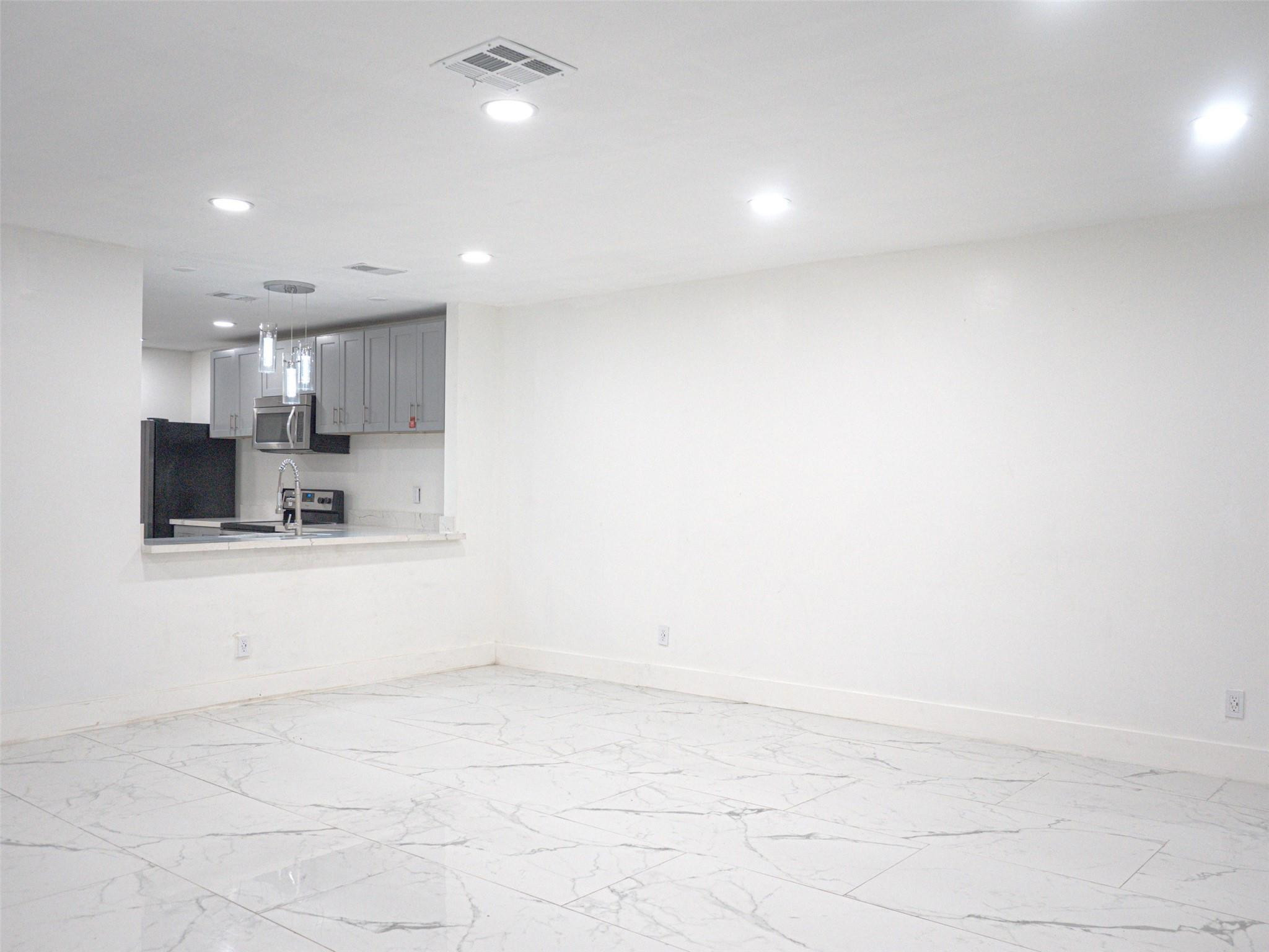 Undisclosed Address Tamarac, FL 33319 - Photo 10 of 21 a view of kitchen with stainless steel appliances cabinets