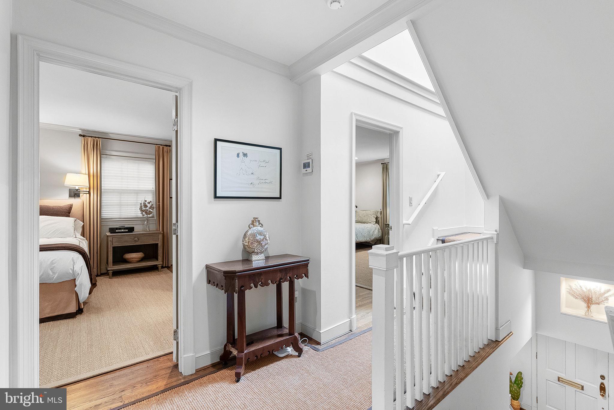 9314 Colesville Road Silver Spring, MD 20901 - Photo 38 of 88 Sundrenched partial view of the second level hall