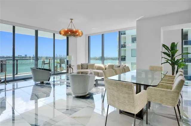 a kitchen with a table and chairs in it