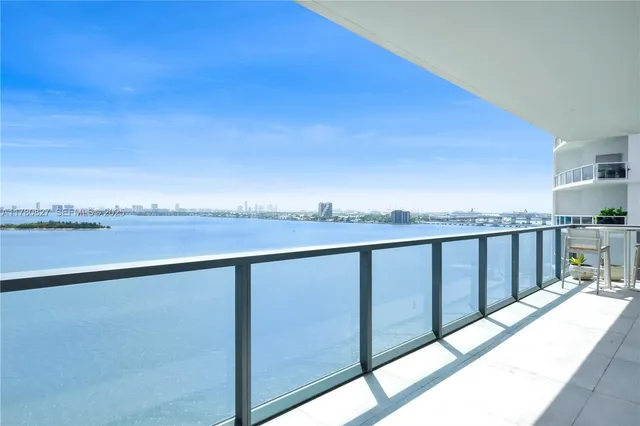 a view of balcony with furniture