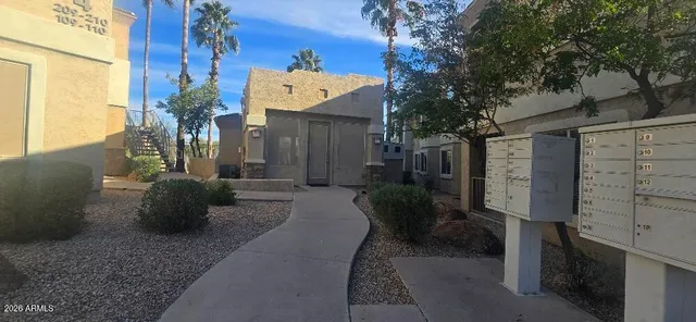 a view of swimming pool with seating space