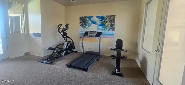 a view of a patio with swimming pool