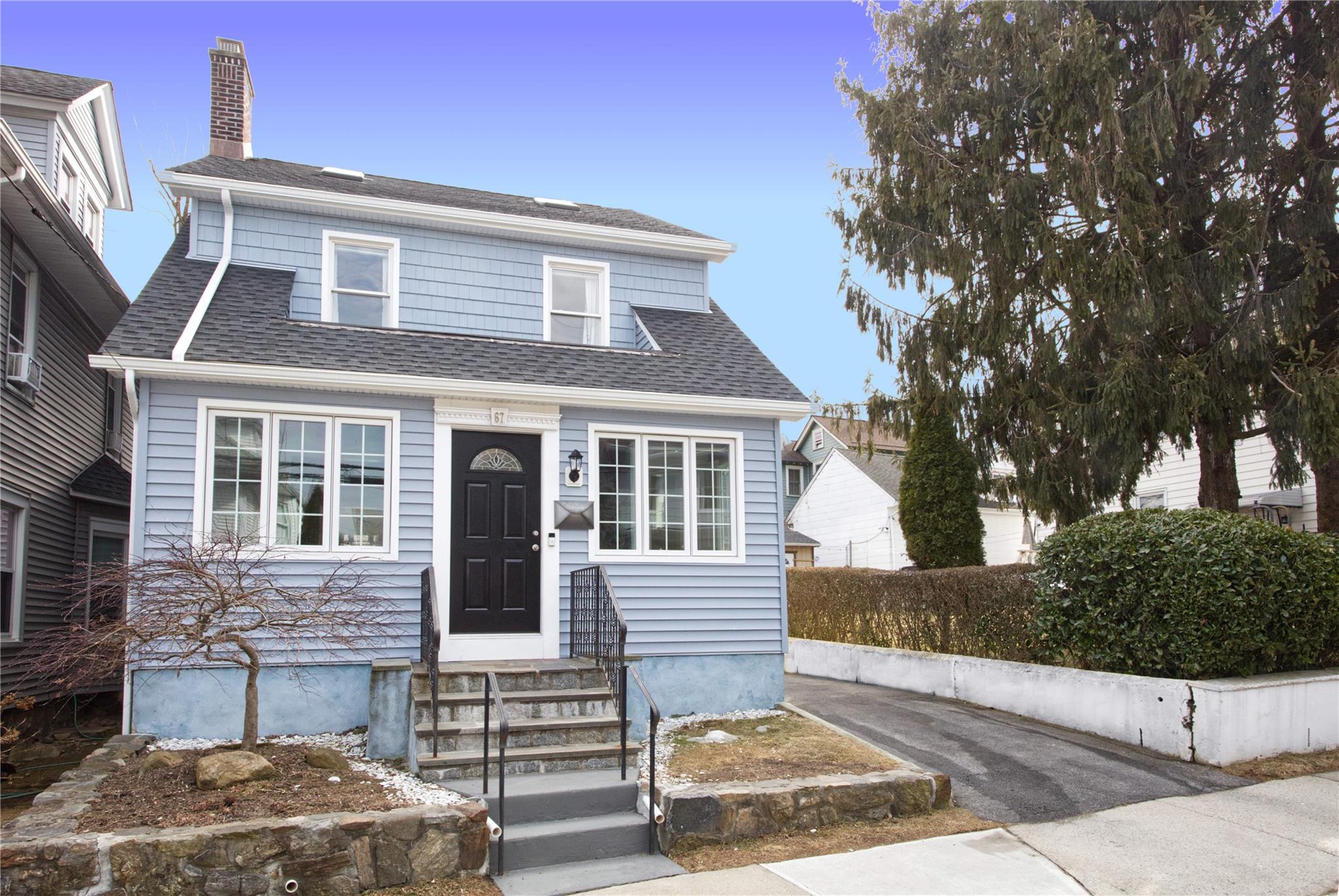 67 Treno Street New Rochelle, NY 10801 - Photo 1 of 1 a front view of a house with a yard