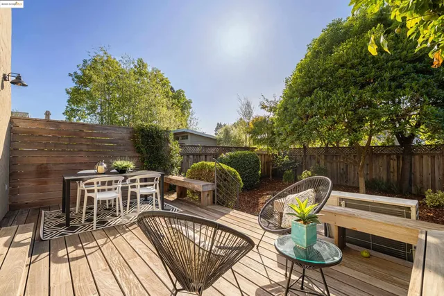 a view of a chairs and table on the terrace