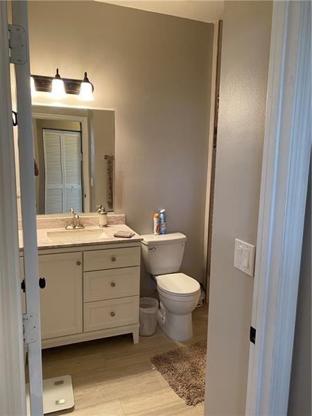 4222 Southwest 132nd Avenue Miramar, FL 33027 - Photo 5 of 11 a bathroom with a sink toilet and mirror