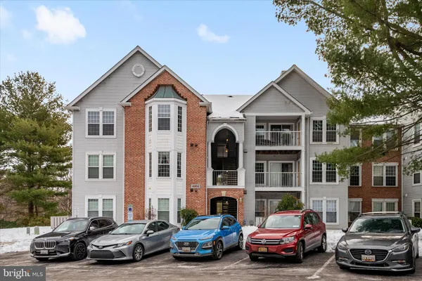 a car parked in front of a house