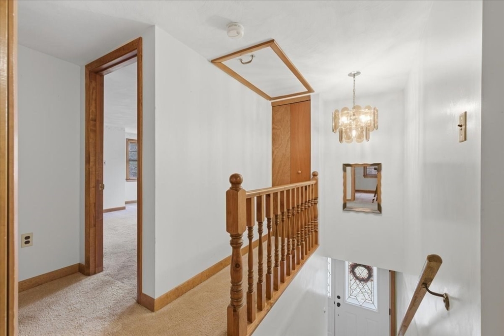 107 Oak Street Pembroke, MA 02359 - Photo 18 of 38 a view of a hallway with entryway door