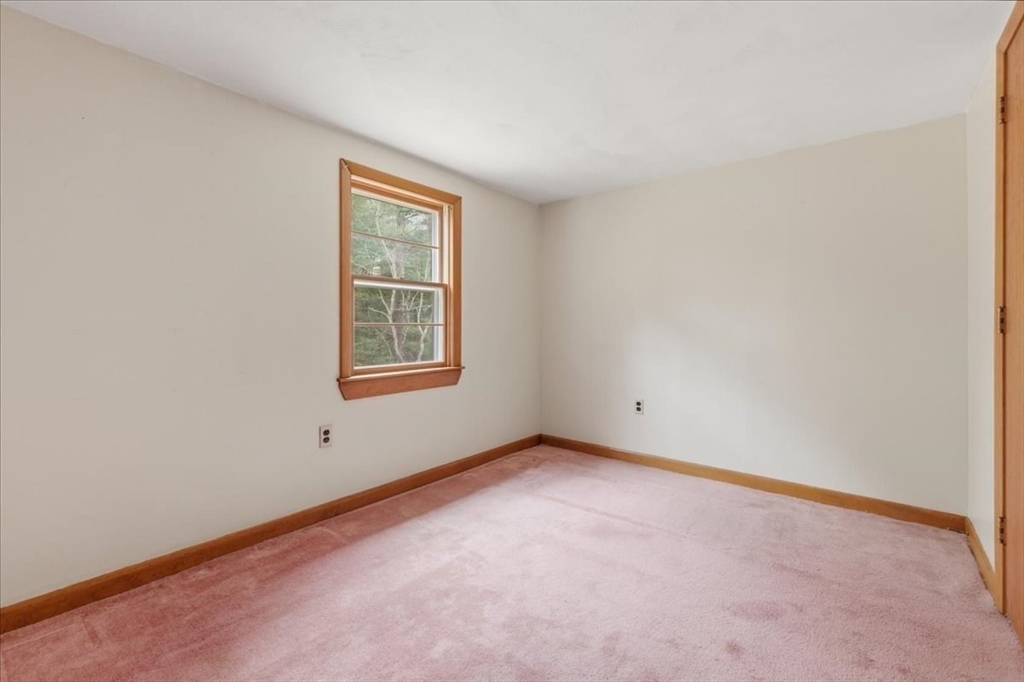 107 Oak Street Pembroke, MA 02359 - Photo 26 of 38 an empty room with windows