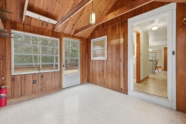 view of an empty room with a window