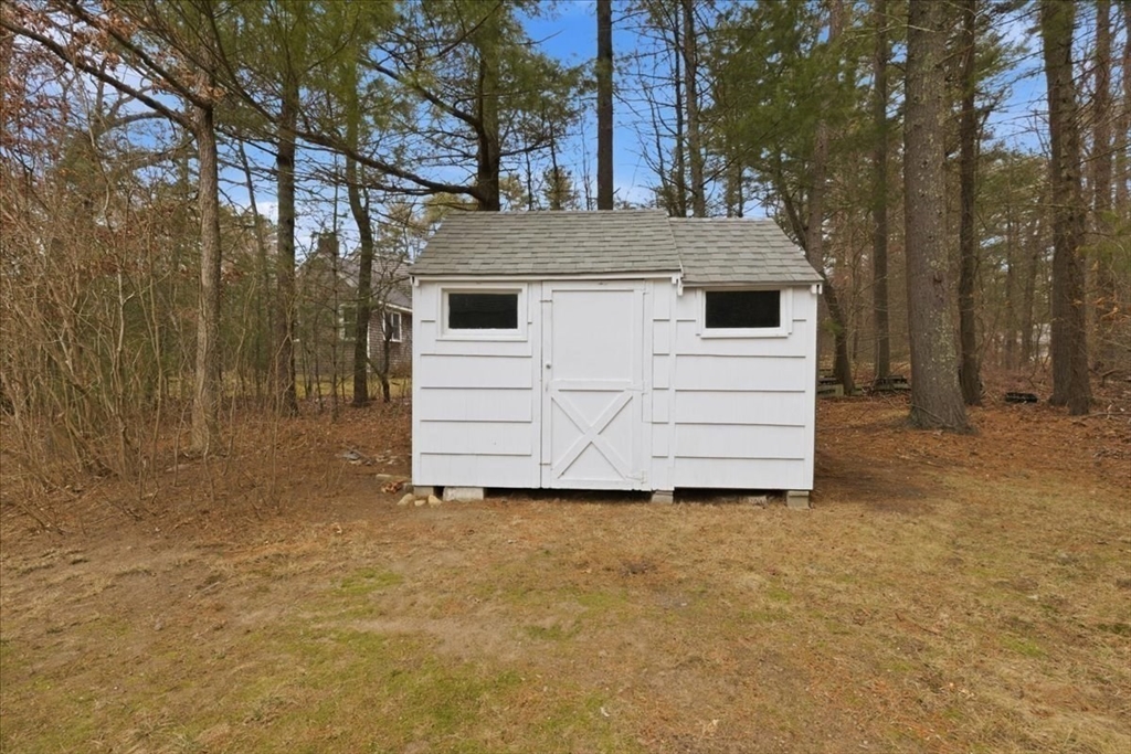 107 Oak Street Pembroke, MA 02359 - Photo 35 of 38 a view of a house with a large tree