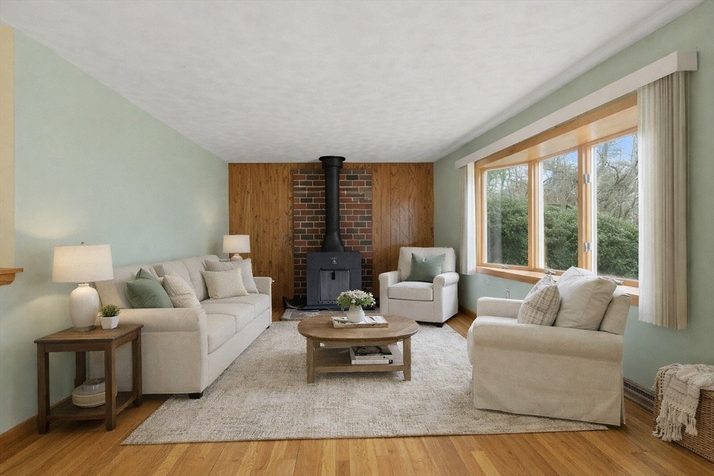 107 Oak Street Pembroke, MA 02359 - Photo 5 of 38 a living room with furniture and a large window
