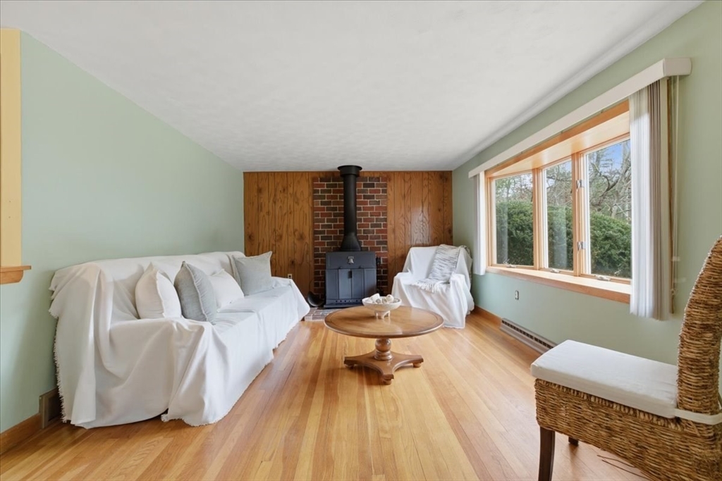 107 Oak Street Pembroke, MA 02359 - Photo 6 of 38 a living room with furniture and a large window