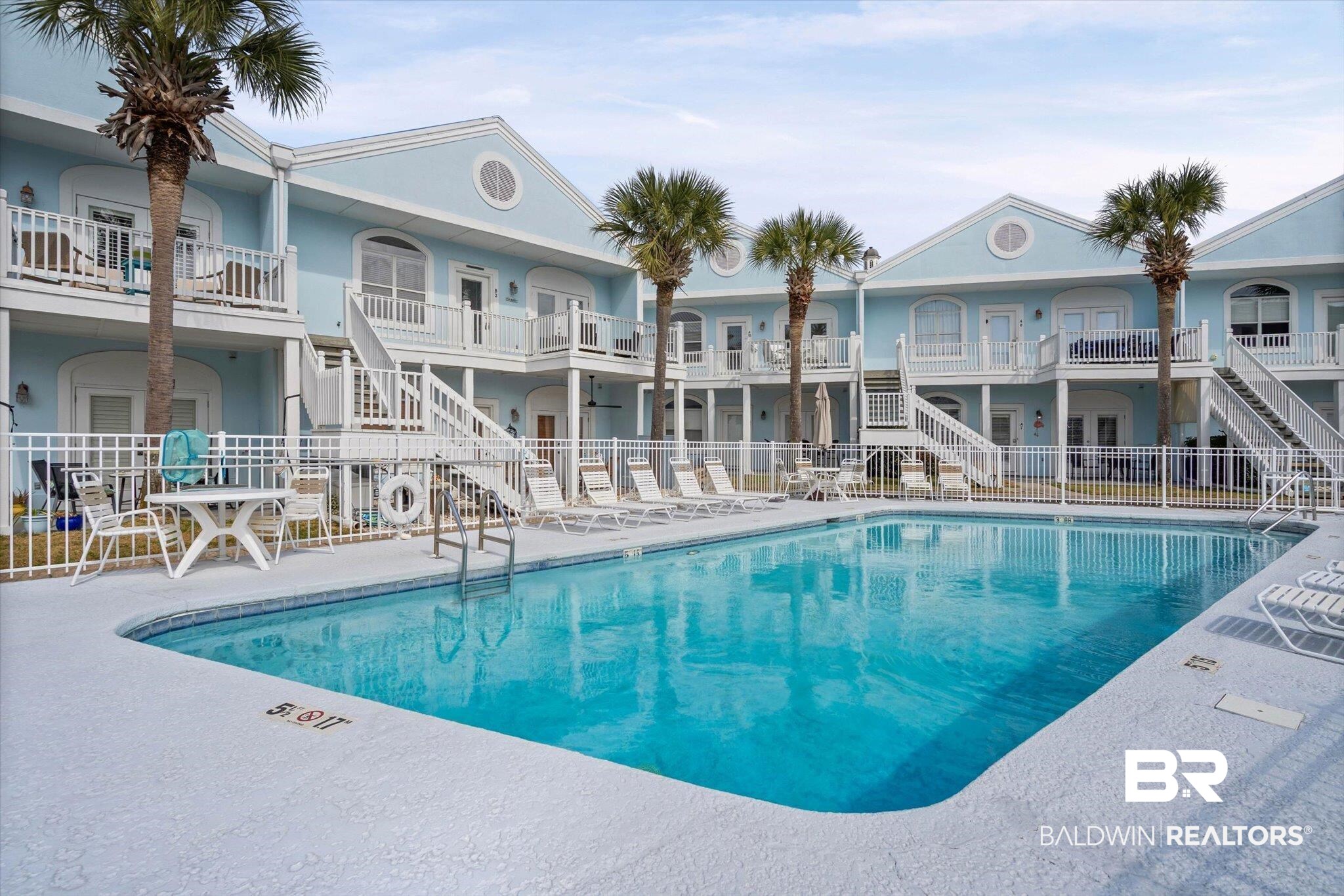 3575 Bayou Road, Unit B2 Orange Beach, AL 36561 - Photo 33 of 35 Community pool featuring stairs and a patio area