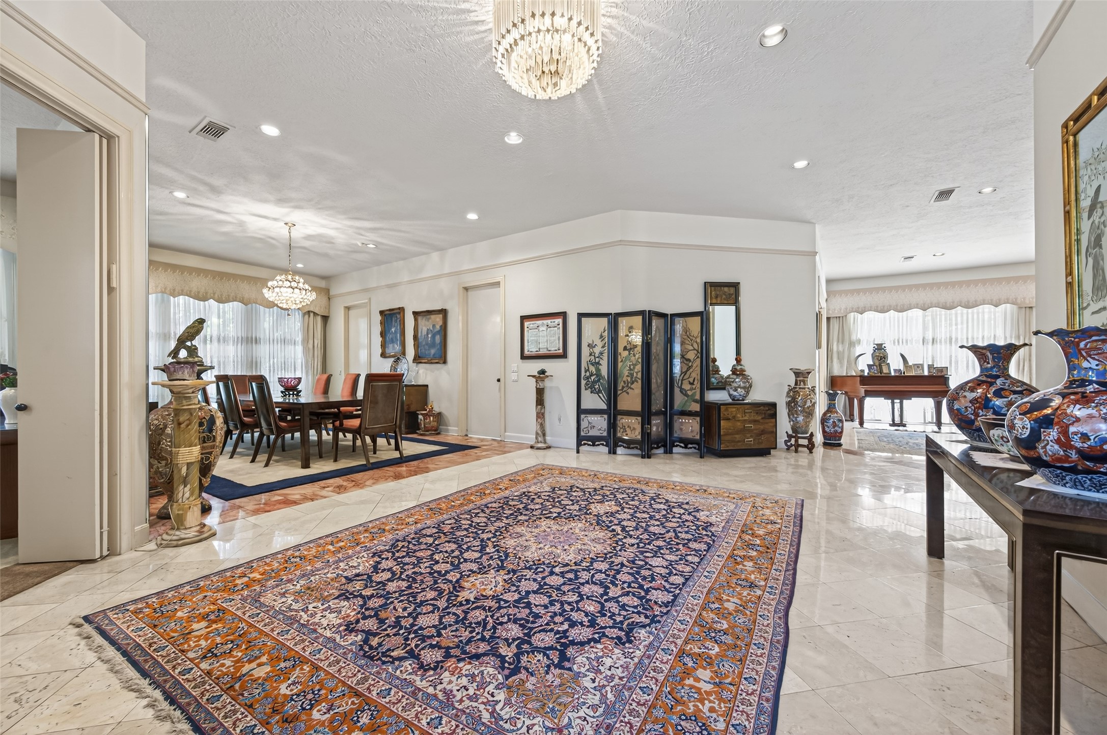 8103 Lake Edge Court Houston, TX 77071 - Photo 5 of 48 Expansive living area with seamless flow into formal dining space