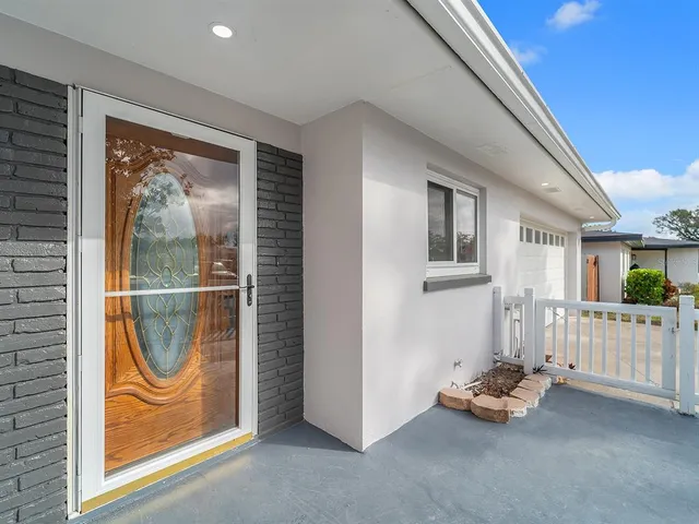 a room with furniture and a window