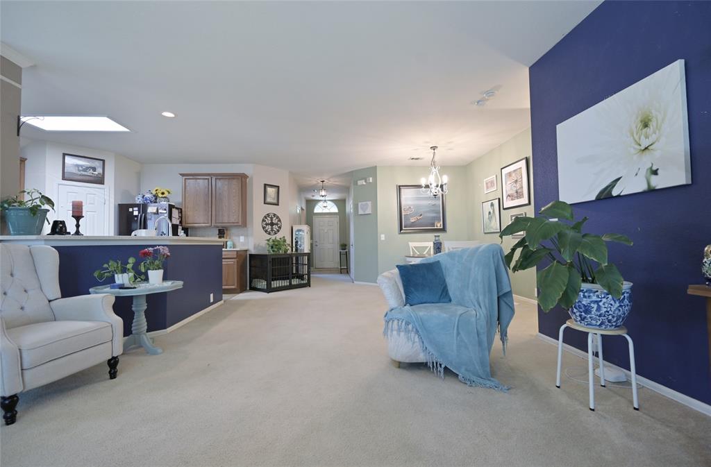 4509 Butterfly Way Fort Worth, TX 76244 - Photo 14 of 40 a living room with furniture and a flat screen tv