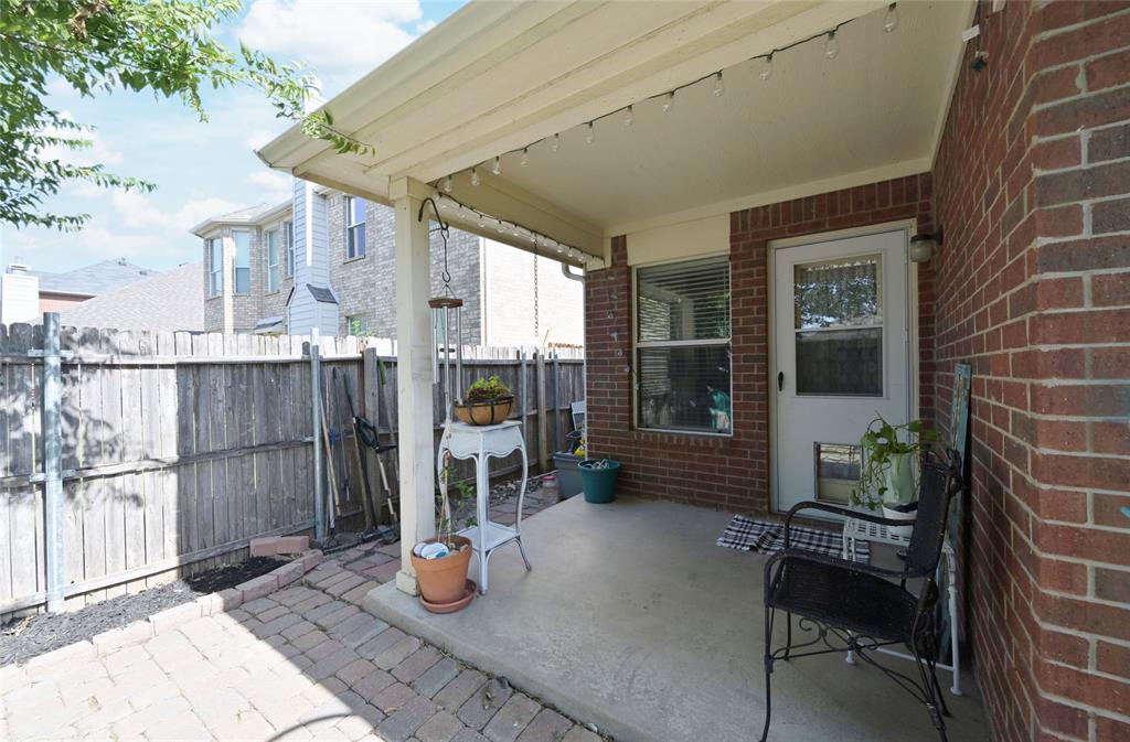 4509 Butterfly Way Fort Worth, TX 76244 - Photo 29 of 40 a garden view with a seating space