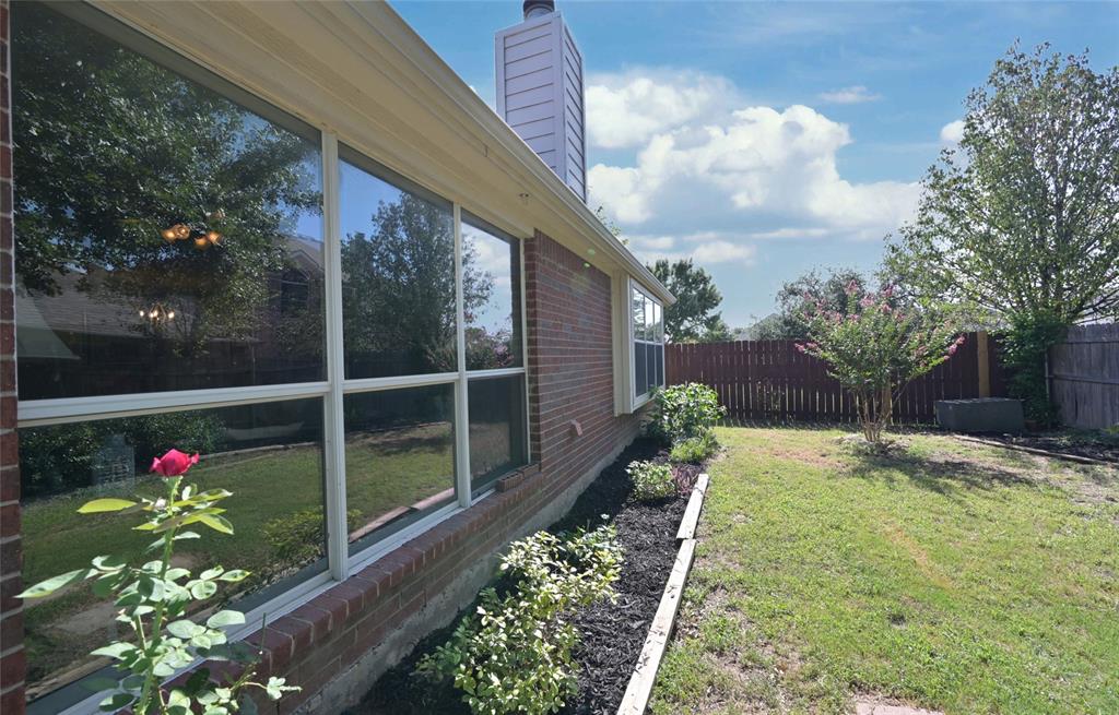4509 Butterfly Way Fort Worth, TX 76244 - Photo 34 of 40 a view of a backyard with pathway