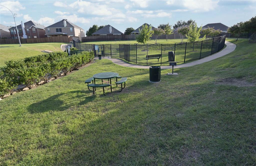 4509 Butterfly Way Fort Worth, TX 76244 - Photo 39 of 40 a view of a house with yard and a pond