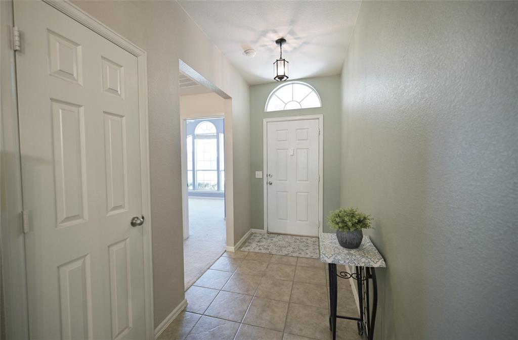4509 Butterfly Way Fort Worth, TX 76244 - Photo 4 of 40 a view of entryway with front door