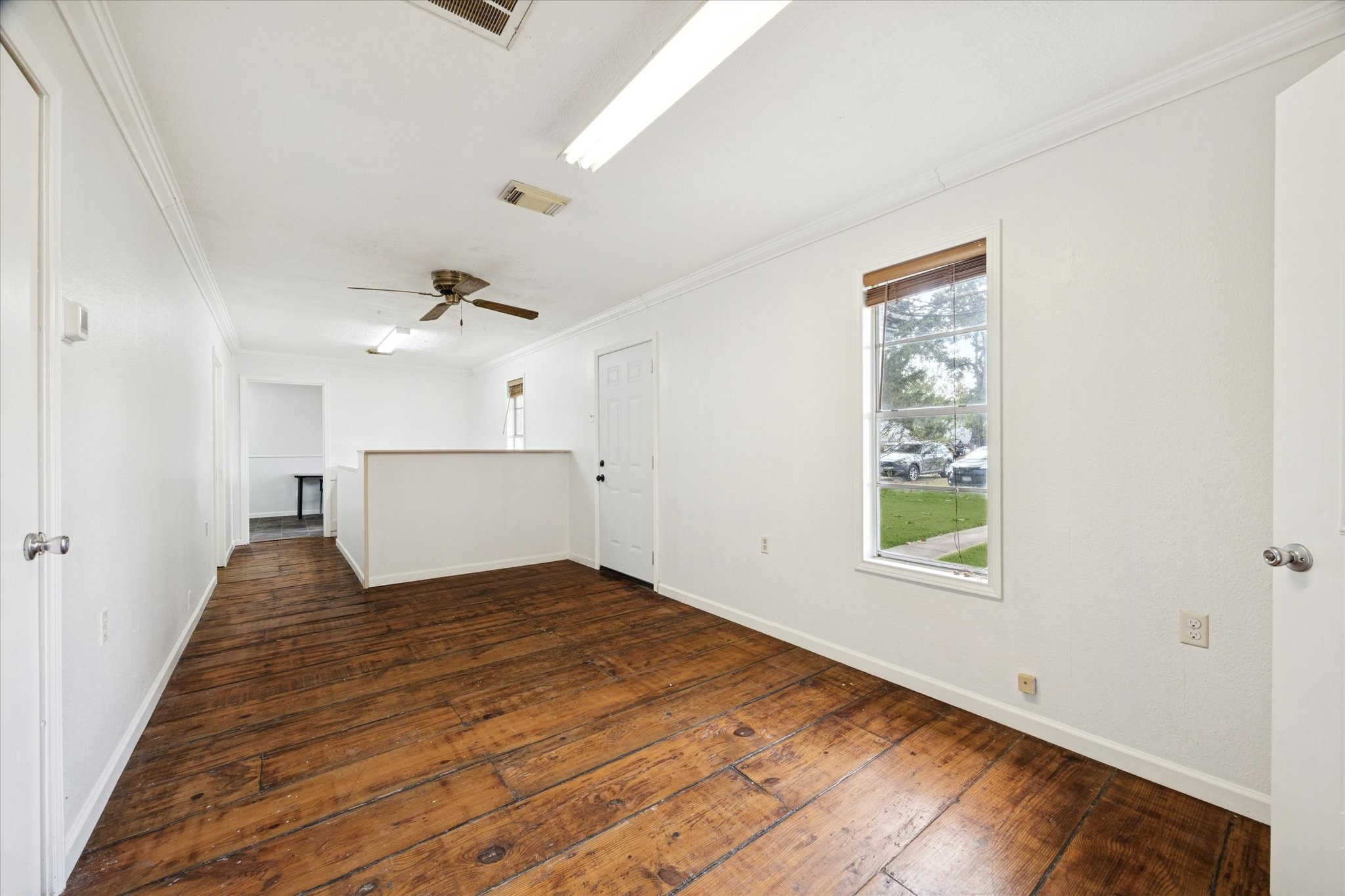 6219 Masters Manvel, TX 77578 - Photo 3 of 10 a view of an empty room and window