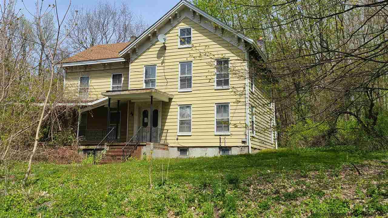 9 Dock Road Milton, NY 12547 - Photo 1 of 30 front view of a house with a yard