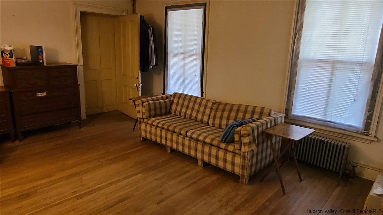 9 Dock Road Milton, NY 12547 - Photo 12 of 30 a living room with furniture and a dresser