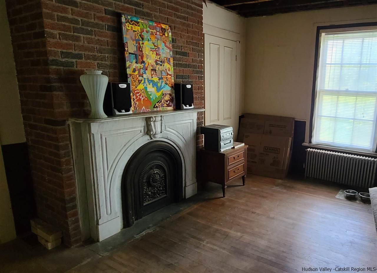 9 Dock Road Milton, NY 12547 - Photo 13 of 30 a living room with furniture and a fireplace