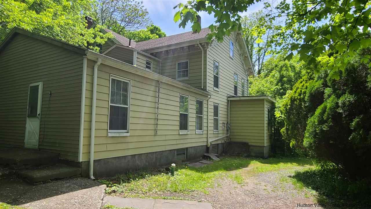 9 Dock Road Milton, NY 12547 - Photo 4 of 30 a view of a small house with a yard