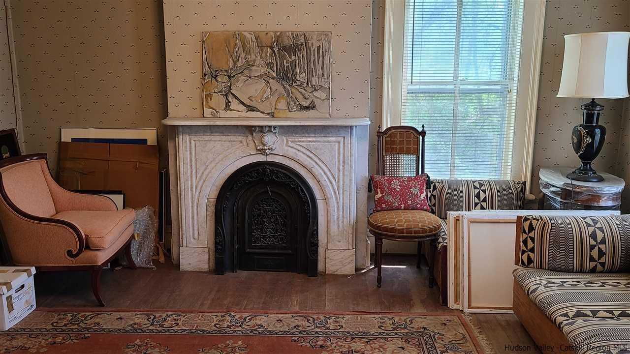 9 Dock Road Milton, NY 12547 - Photo 7 of 30 a living room with furniture and a fireplace